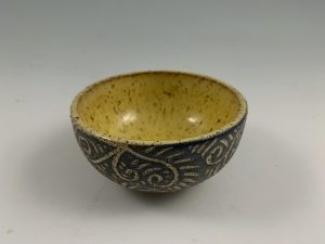 small yellow sgraffito bowl