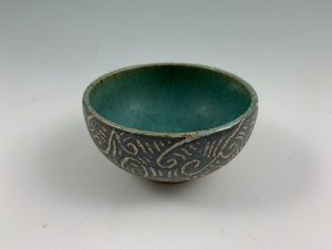 green sgraffito bowl