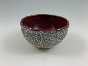 small purple sgraffito bowl