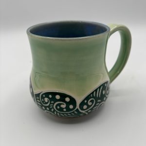 green sgraffito mug