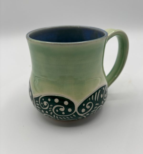 green sgraffito mug